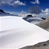 Zwischenlandung beim riesigen Windkolk beim Clariden Gletscher